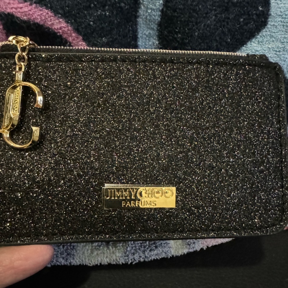 Jimmy Cho coin purse small but very nice and lovely. Brand new